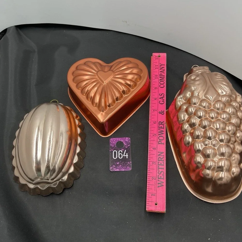 Three metal  Jell-O‎ wall hanging mold